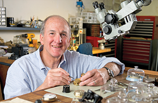 President Barchi repairing a clock